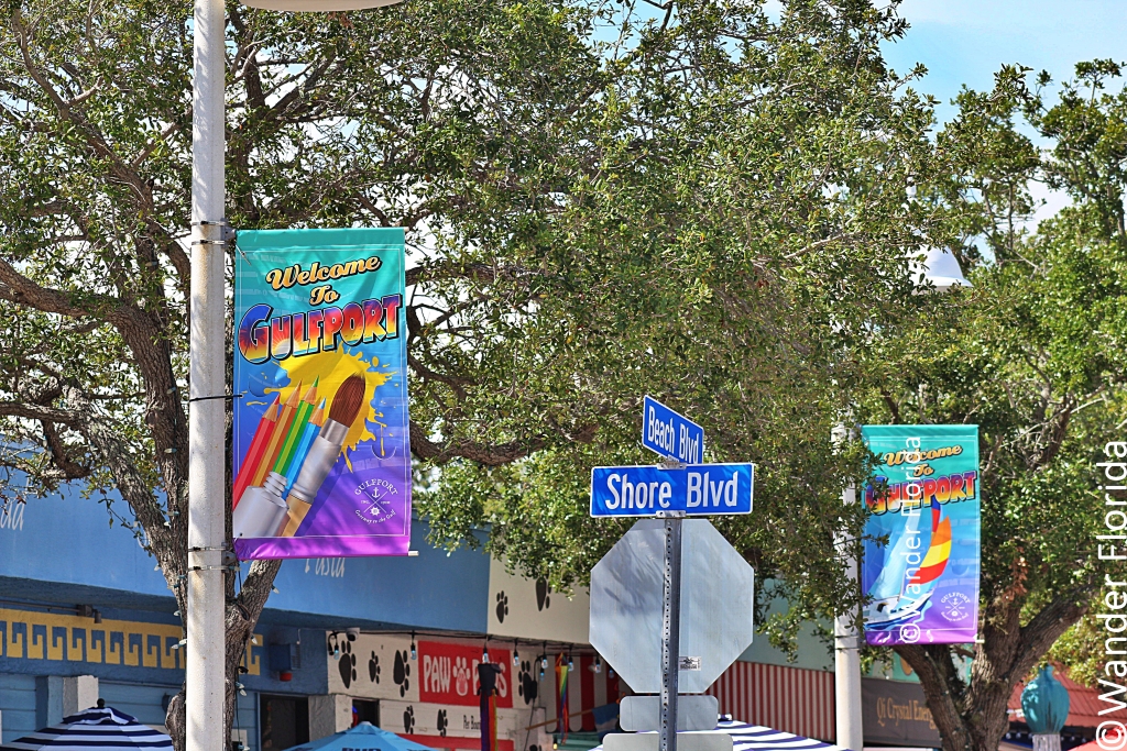 GeckoFest: Gulfport's Epic Way to End the Summer 2 The street posts in Gulfport feature flags welcoming visitors to the waterfront village.